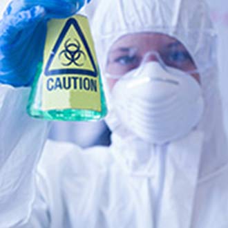 photo of worker in protective clothing