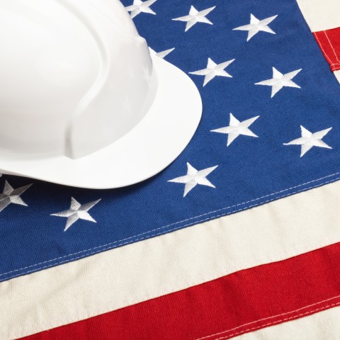 hard hat sitting on top of a flag
